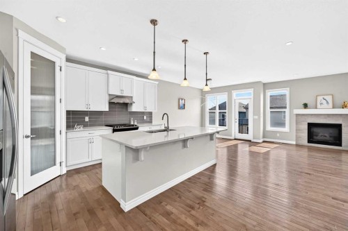 82 Nolanhurst Rise Nw, Calgary, AB - Indoor Photo Showing Kitchen With Fireplace With Upgraded Kitchen
