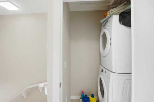 904-218 Sherwood Square Nw, Calgary, AB - Indoor Photo Showing Laundry Room