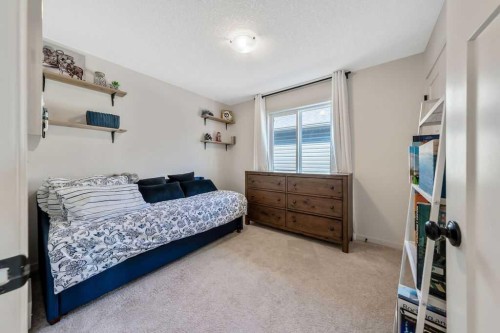 114 Seton Grove Se, Calgary, AB - Indoor Photo Showing Bedroom