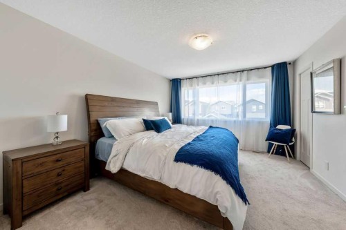 114 Seton Grove Se, Calgary, AB - Indoor Photo Showing Bedroom