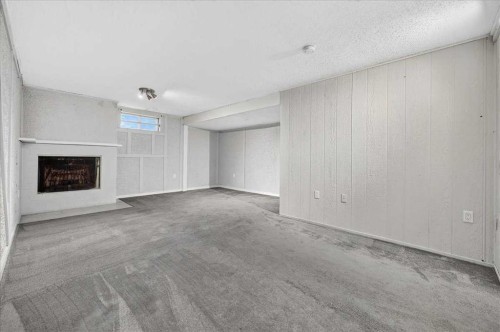 136 Templeview Place Ne, Calgary, AB - Indoor With Fireplace