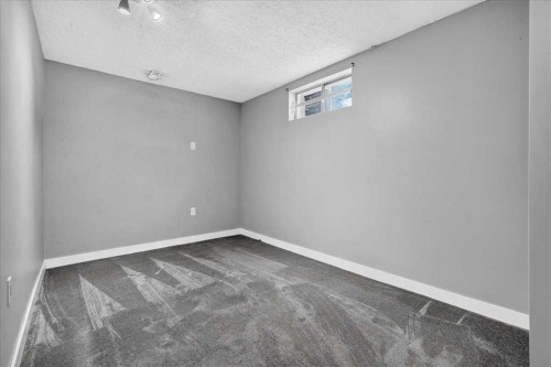 136 Templeview Place Ne, Calgary, AB - Indoor Photo Showing Other Room