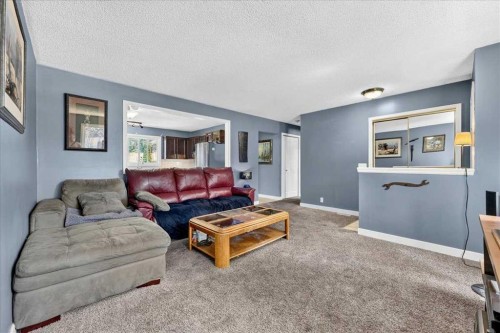 136 Templeview Place Ne, Calgary, AB - Indoor Photo Showing Living Room