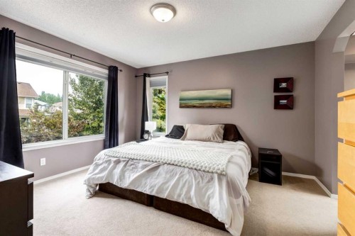 156 Tuscany Meadows Close Nw, Calgary, AB - Indoor Photo Showing Bedroom