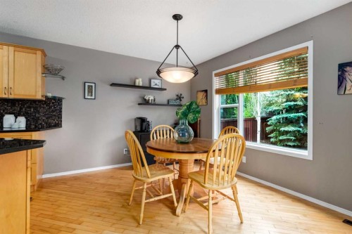 156 Tuscany Meadows Close Nw, Calgary, AB - Indoor Photo Showing Dining Room