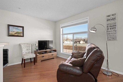 2321-700 Willowbrook Road Nw, Airdrie, AB - Indoor Photo Showing Living Room