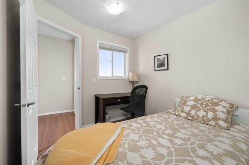 2321-700 Willowbrook Road Nw, Airdrie, AB - Indoor Photo Showing Bedroom