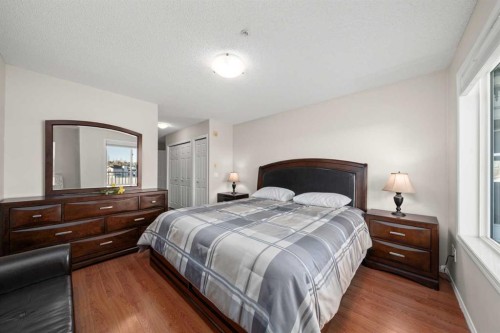 2321-700 Willowbrook Road Nw, Airdrie, AB - Indoor Photo Showing Bedroom