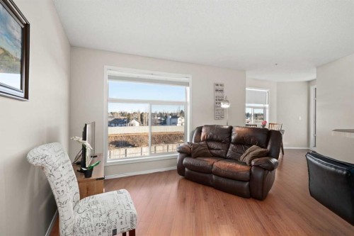 2321-700 Willowbrook Road Nw, Airdrie, AB - Indoor Photo Showing Living Room