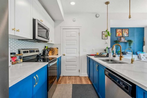 4367 Seton Drive Se, Calgary, AB - Indoor Photo Showing Kitchen With Stainless Steel Kitchen With Double Sink With Upgraded Kitchen