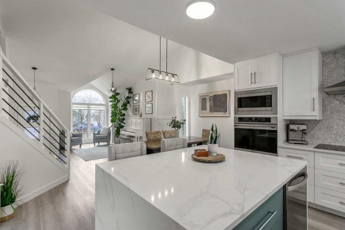 59 Rivercroft Close Se, Calgary, AB - Indoor Photo Showing Kitchen With Upgraded Kitchen