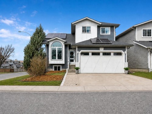 59 Rivercroft Close Se, Calgary, AB - Outdoor With Facade