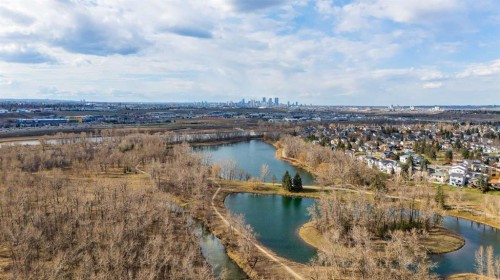 59 Rivercroft Close Se, Calgary, AB - Outdoor With Body Of Water With View