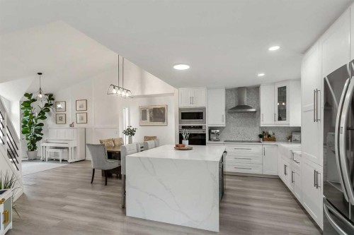 59 Rivercroft Close Se, Calgary, AB - Indoor Photo Showing Kitchen With Stainless Steel Kitchen With Upgraded Kitchen