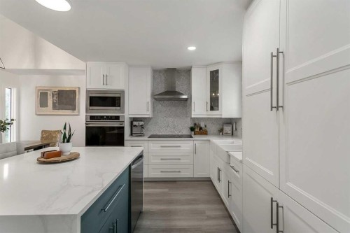 59 Rivercroft Close Se, Calgary, AB - Indoor Photo Showing Kitchen With Upgraded Kitchen