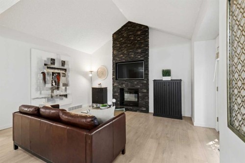 14125 Evergreen Street Sw, Calgary, AB - Indoor With Fireplace