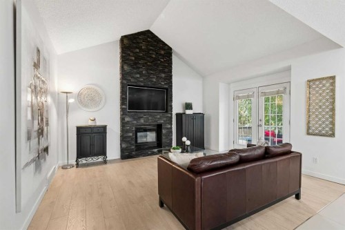 14125 Evergreen Street Sw, Calgary, AB - Indoor Photo Showing Living Room With Fireplace