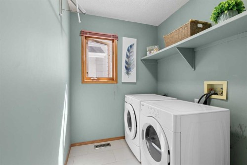 14125 Evergreen Street Sw, Calgary, AB - Indoor Photo Showing Laundry Room
