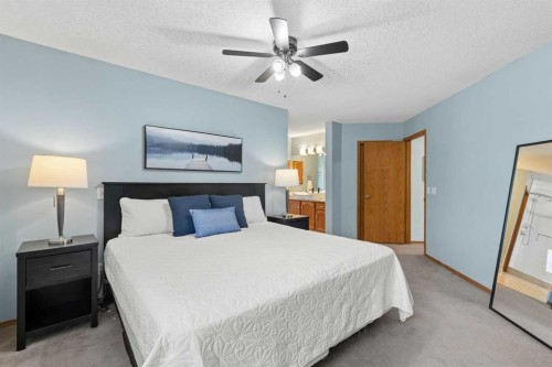 14125 Evergreen Street Sw, Calgary, AB - Indoor Photo Showing Bedroom