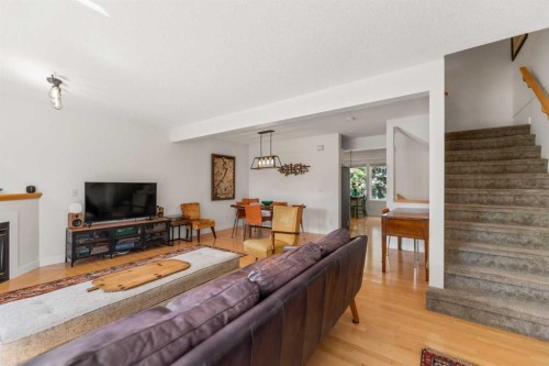 472 Regal Park Ne, Calgary, AB - Indoor Photo Showing Other Room With Fireplace