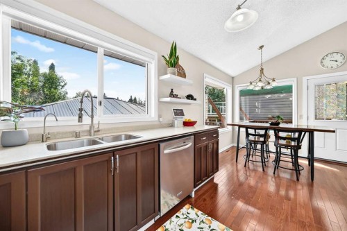144 Riverstone Crescent Se, Calgary, AB - Indoor Photo Showing Kitchen With Double Sink