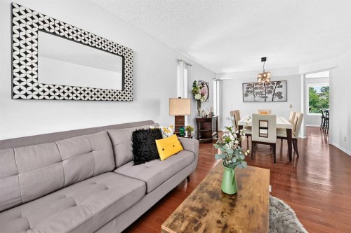 144 Riverstone Crescent Se, Calgary, AB - Indoor Photo Showing Living Room