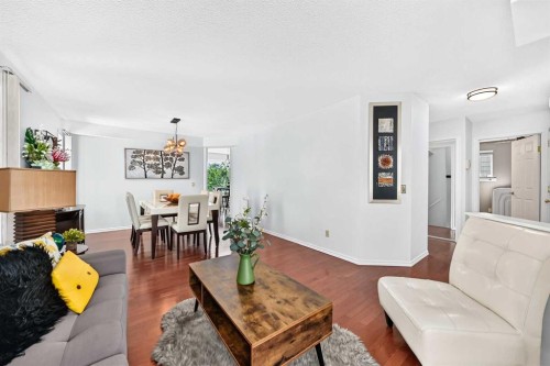 144 Riverstone Crescent Se, Calgary, AB - Indoor Photo Showing Living Room