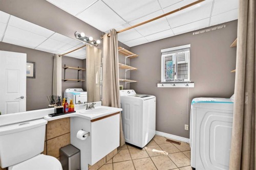 144 Riverstone Crescent Se, Calgary, AB - Indoor Photo Showing Laundry Room