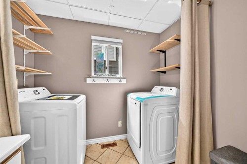 144 Riverstone Crescent Se, Calgary, AB - Indoor Photo Showing Laundry Room