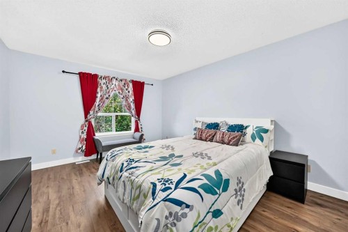 144 Riverstone Crescent Se, Calgary, AB - Indoor Photo Showing Bedroom