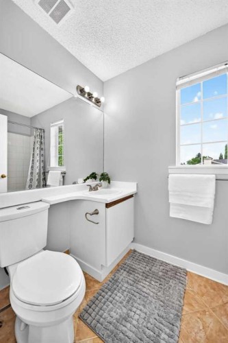 144 Riverstone Crescent Se, Calgary, AB - Indoor Photo Showing Bathroom
