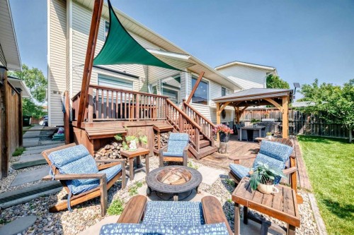 144 Riverstone Crescent Se, Calgary, AB - Outdoor With Deck Patio Veranda With Exterior