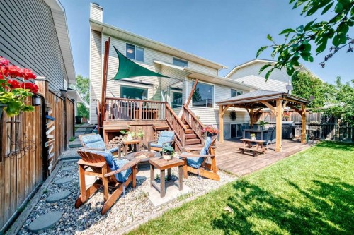 144 Riverstone Crescent Se, Calgary, AB - Outdoor With Deck Patio Veranda