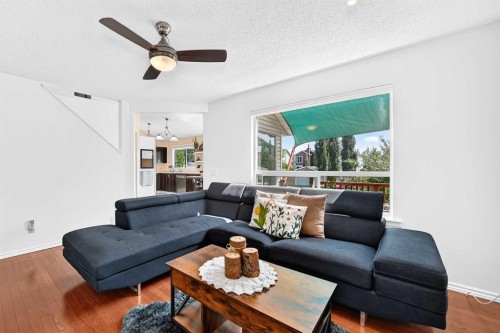 144 Riverstone Crescent Se, Calgary, AB - Indoor Photo Showing Living Room
