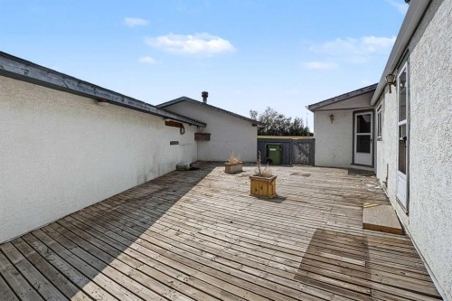 145 Spring Haven Mews Se, Airdrie, AB - Outdoor With Deck Patio Veranda With Exterior