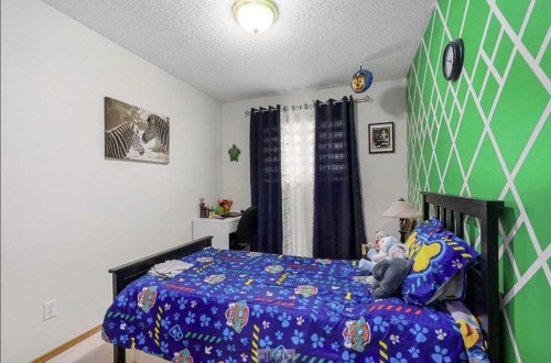 160 Millview Green Sw, Calgary, AB - Indoor Photo Showing Bedroom