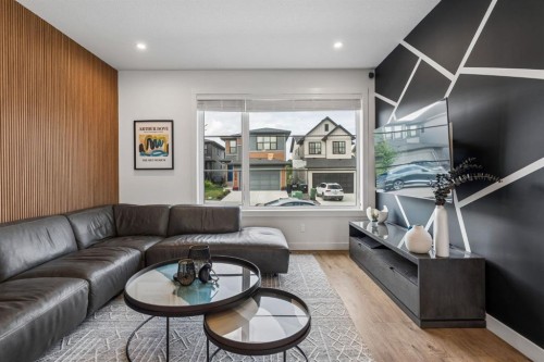 125 Rochester Way Nw, Calgary, AB - Indoor Photo Showing Living Room