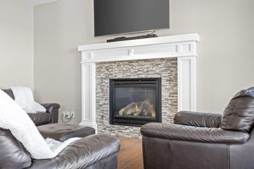 27 Mahogany Crescent Se, Calgary, AB - Indoor Photo Showing Living Room With Fireplace