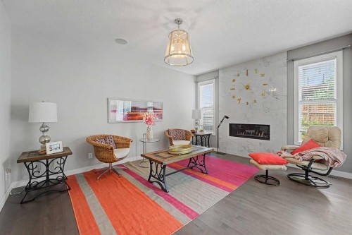 605 Nolan Hill Boulevard Nw, Calgary, AB - Indoor Photo Showing Living Room With Fireplace
