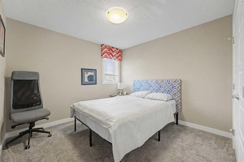 605 Nolan Hill Boulevard Nw, Calgary, AB - Indoor Photo Showing Bedroom