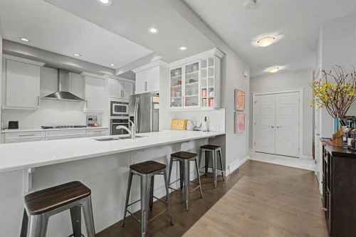 605 Nolan Hill Boulevard Nw, Calgary, AB - Indoor Photo Showing Kitchen With Double Sink With Upgraded Kitchen