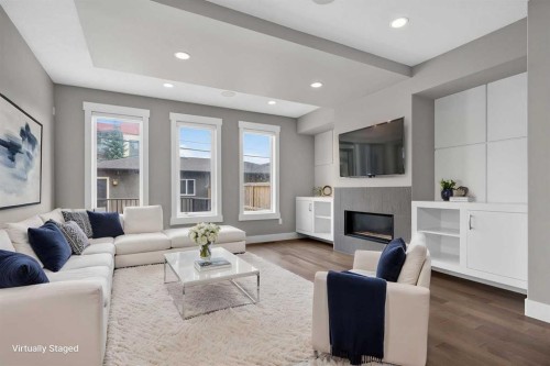 3318 Centre B Street Nw, Calgary, AB - Indoor Photo Showing Living Room With Fireplace