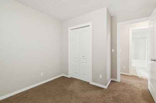 92 Cougar Ridge Close Sw, Calgary, AB - Indoor Photo Showing Other Room