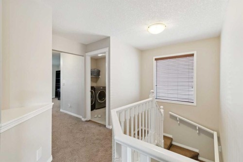 92 Cougar Ridge Close Sw, Calgary, AB - Indoor Photo Showing Other Room