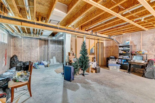92 Cougar Ridge Close Sw, Calgary, AB - Indoor Photo Showing Basement