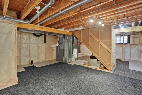 706 Everridge Drive Sw, Calgary, AB - Indoor Photo Showing Basement