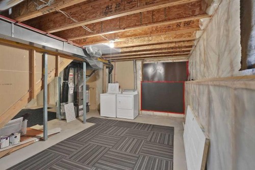 706 Everridge Drive Sw, Calgary, AB - Indoor Photo Showing Basement