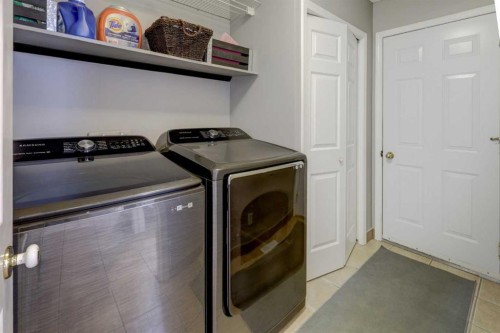 215 Arbour Ridge Way Nw, Calgary, AB - Indoor Photo Showing Laundry Room
