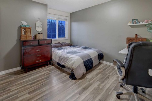 215 Arbour Ridge Way Nw, Calgary, AB - Indoor Photo Showing Bedroom