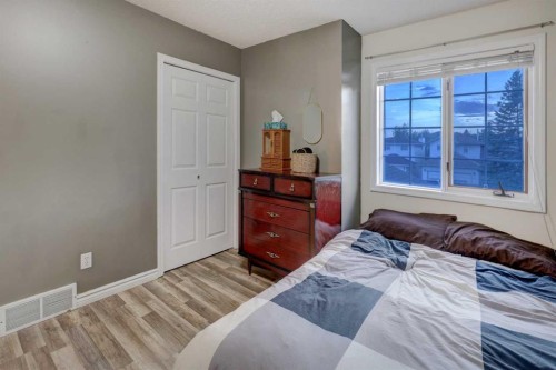 215 Arbour Ridge Way Nw, Calgary, AB - Indoor Photo Showing Bedroom
